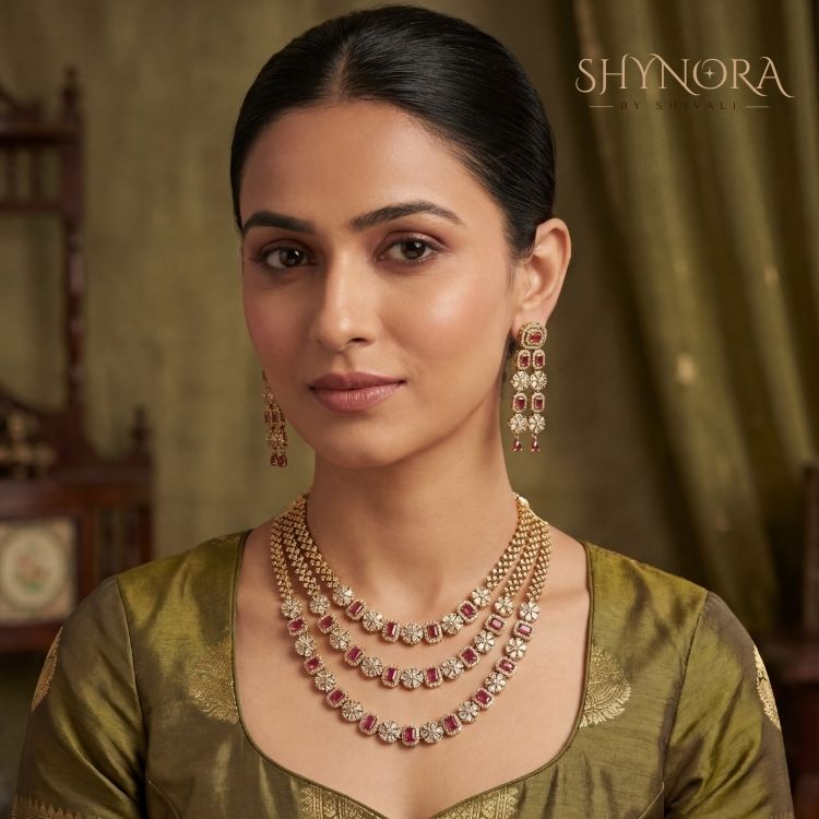 Purple Triple Layer AD Necklace Set in gold tone. Perfect for weddings, festive & party wear.