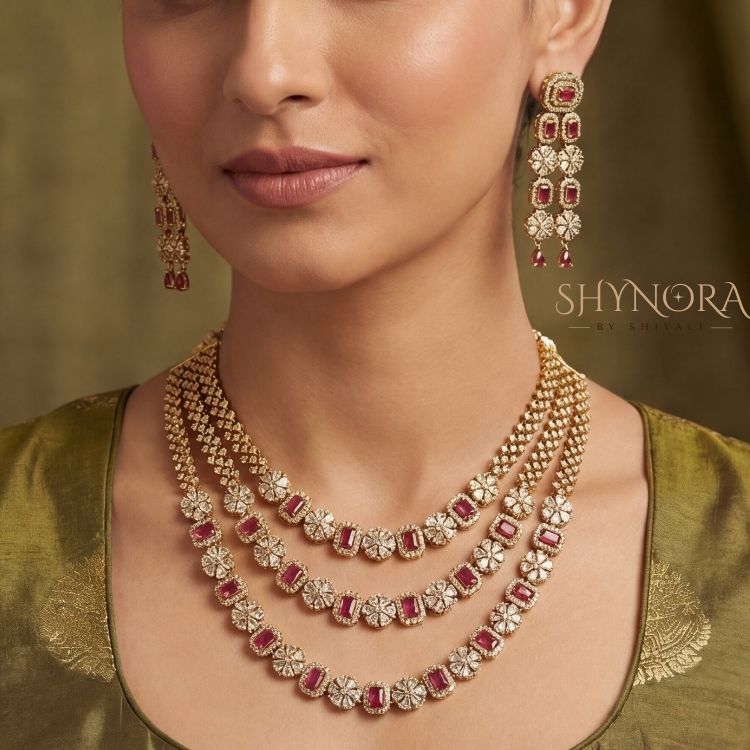 Purple Triple Layer AD Necklace Set in gold tone. Perfect for weddings, festive & party wear.